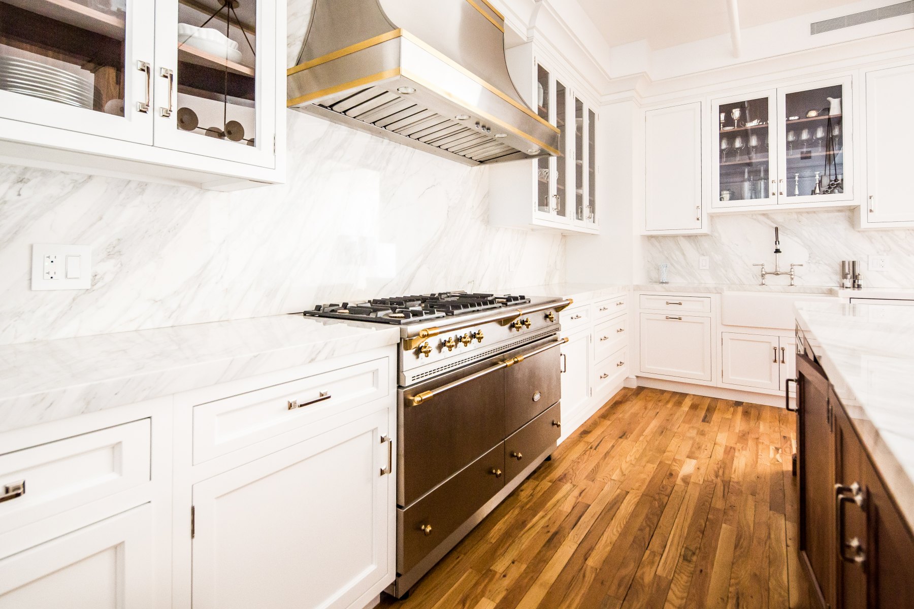 Range and brass-trimmed hood
